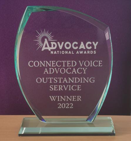 Advocacy Award - text on glass award reads 'Connected Voice Advocacy Outstanding Service Winner 2022